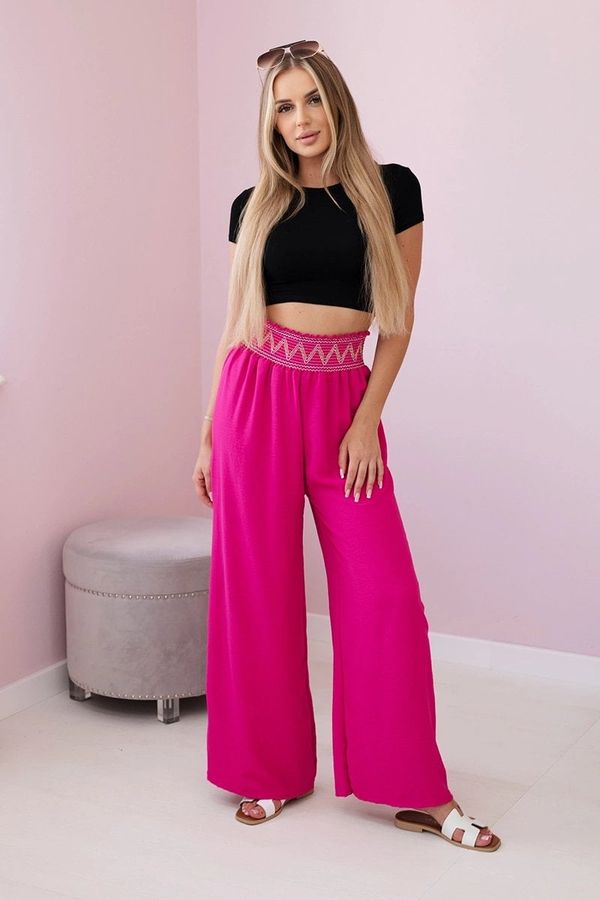 Kesi Trousers with a wide elastic waistband in fuchsia