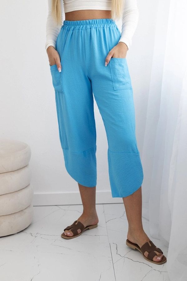 Kesi Turquoise trousers with wide legs and pockets