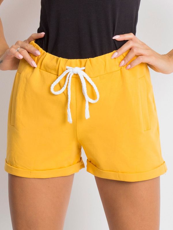 Fashionhunters Women's cotton shorts dark yellow