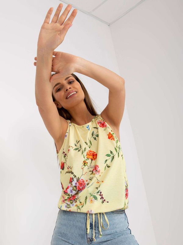 Fashionhunters Yellow patterned top with neckline at back