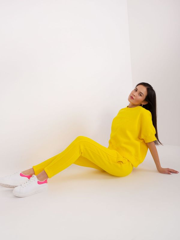 Fashionhunters Yellow tracksuit with sweatshirt with patch