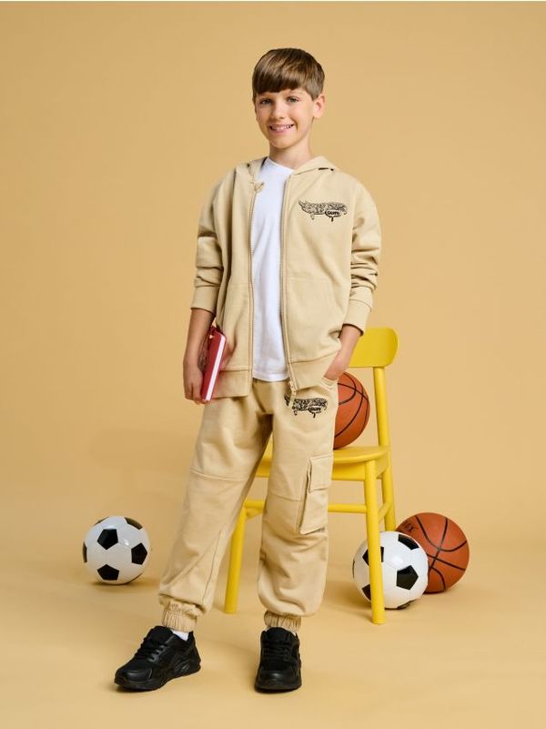 Sinsay Sinsay - Hlače Hot Wheels - krem